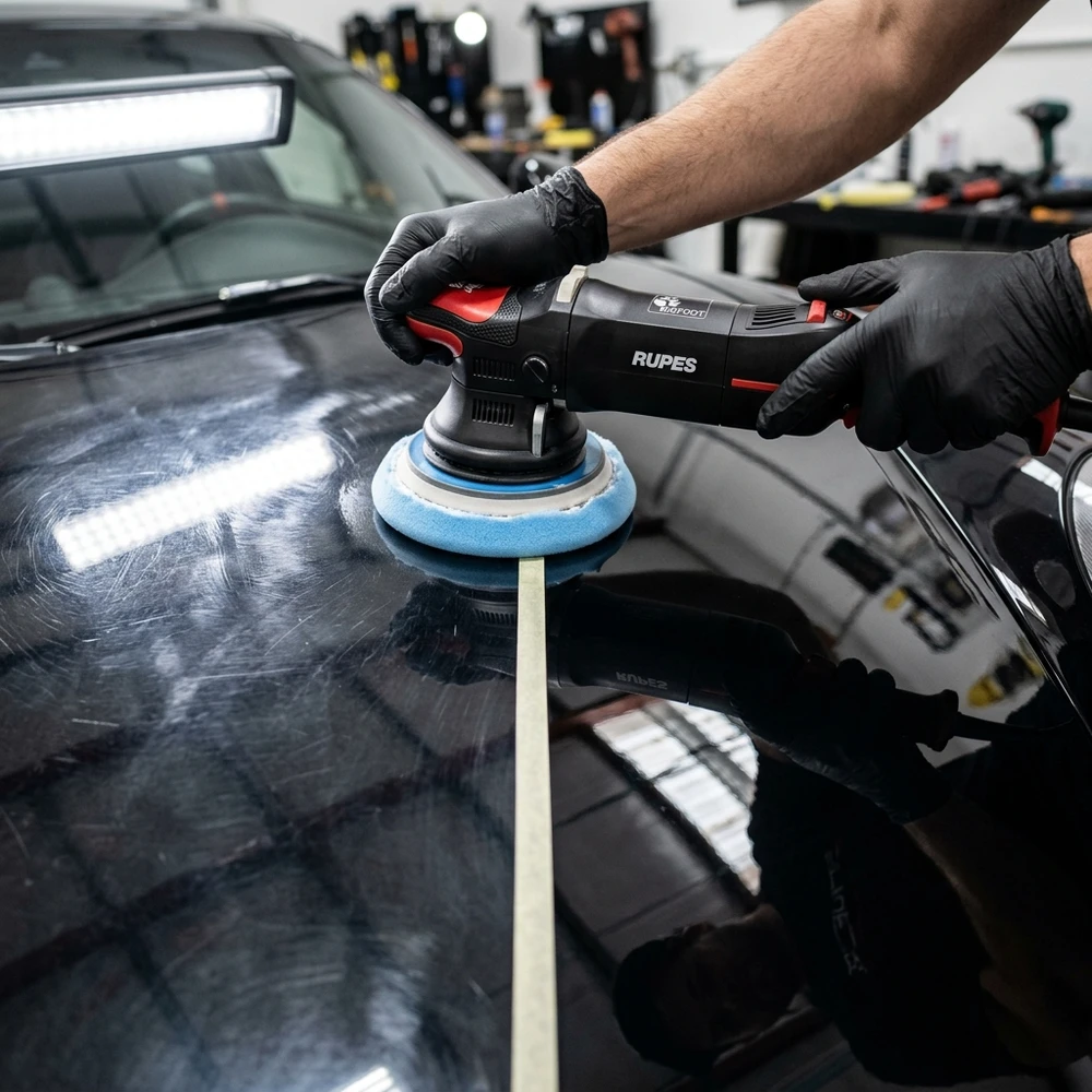 Dual-action machine polisher removing swirl marks and restoring clear coat gloss